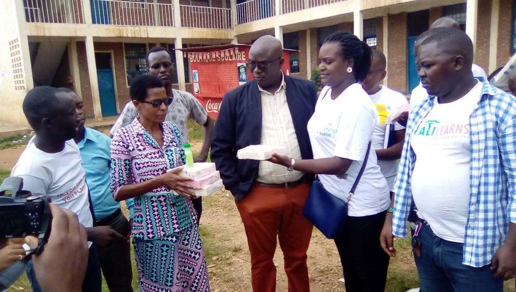 UJEAD-Akeza Company with other young people donating bar soap to Buyenzi High School in April 2020 after covid-19 cases were confirmed in Burundi